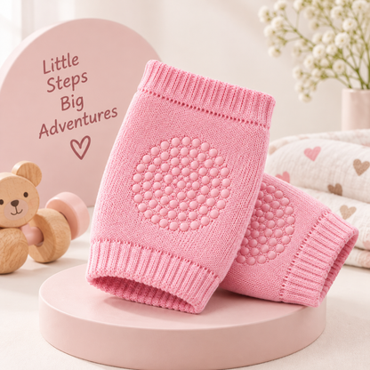 Pink baby knee and elbow pads with breathable stretch fabric and non-slip grip dots
