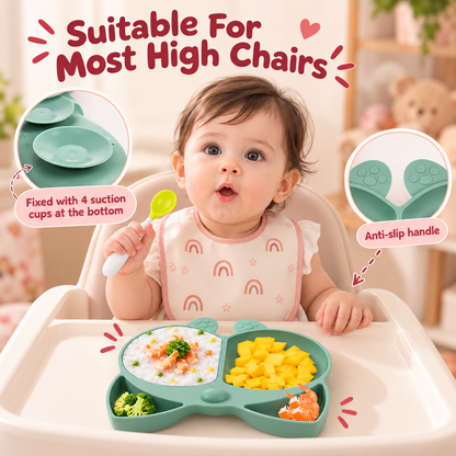 Baby in a high chair eating from a Nestush Corgi silicone plate fixed with 4 suction cups