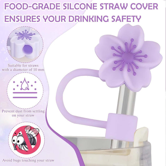 Close-up of NestSip food-grade silicone sakura flower straw topper covering a stainless steel straw for hygiene and dust protection