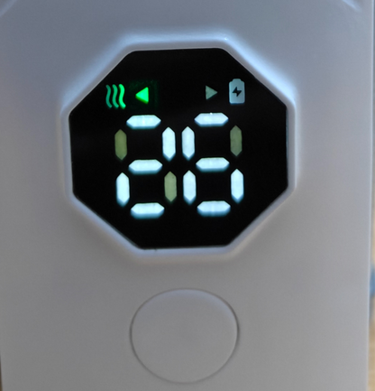Close-up of Nestush bottle warmer LED display showing real-time temperature