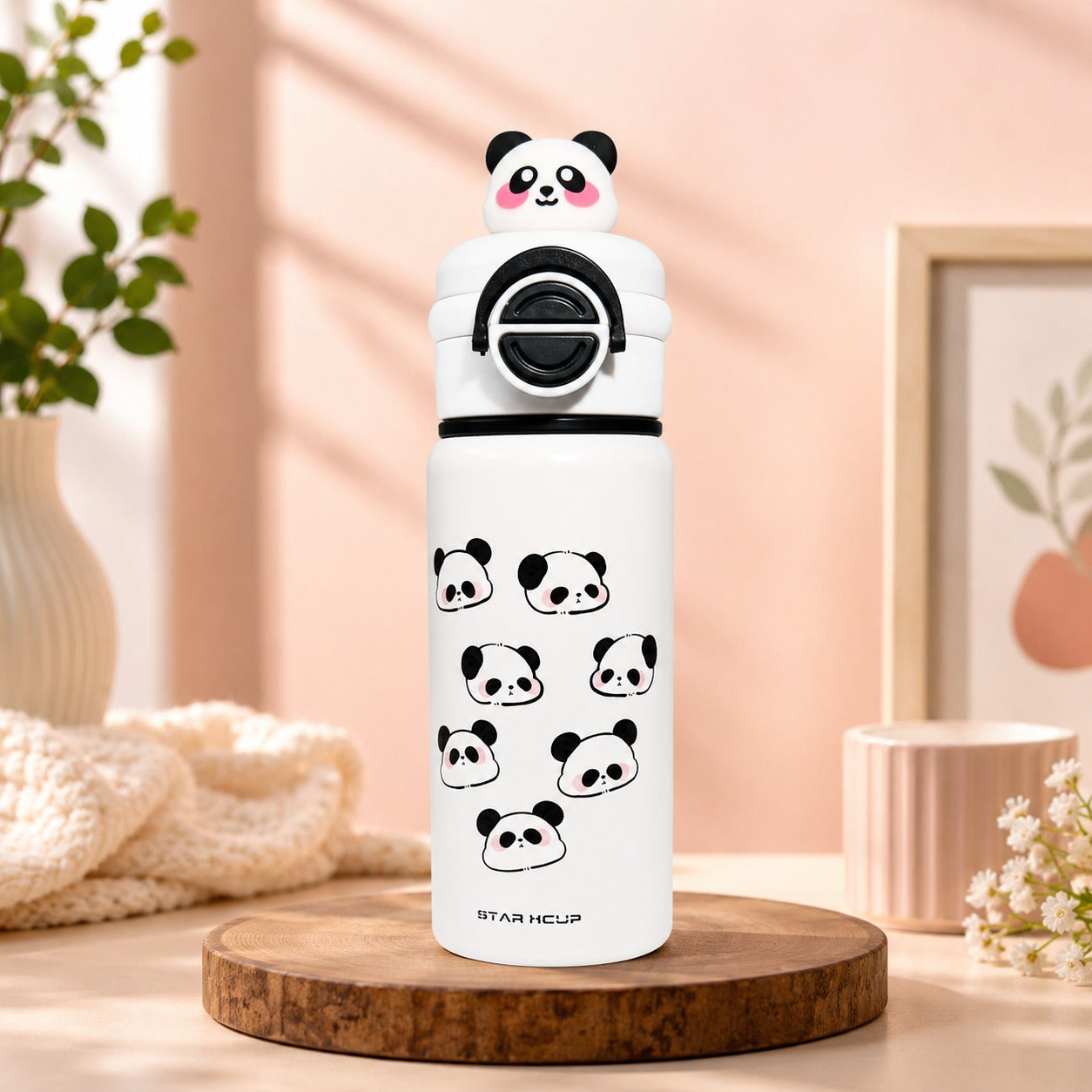 NestPanda Insulated Water Bottle in Cloud White with panda face pattern and carry strap