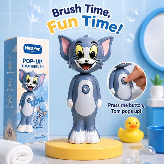 NestPop Tom pop-up toothbrush for kids displayed with its packaging in a playful blue bathroom setting