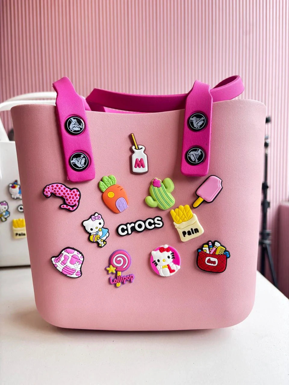 NestVibe silicone jelly tote bag with charm decorations, front view