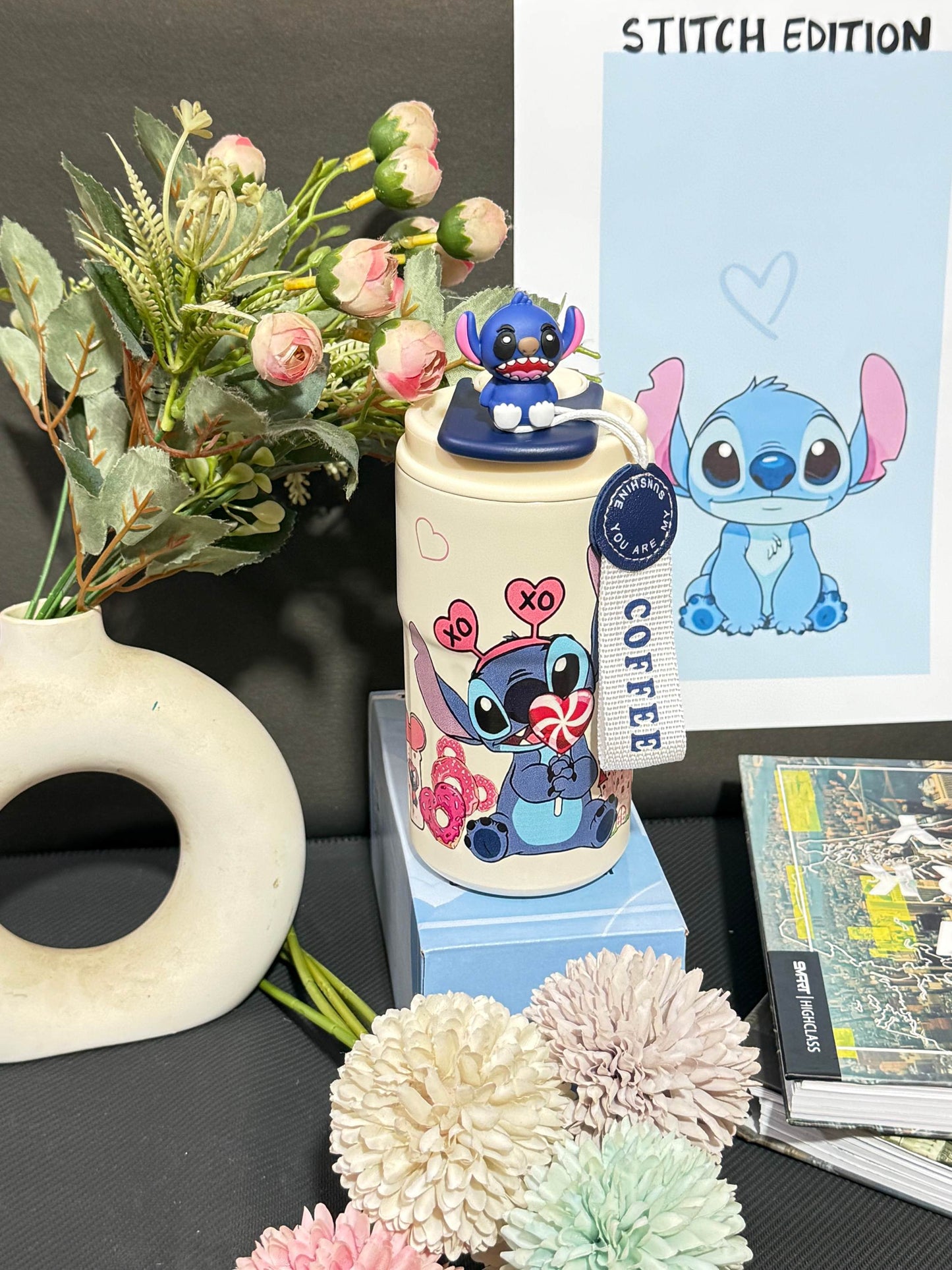 Nestush 450ml insulated kids tumbler featuring a cute blue character with candy and heart artwork, character topper and carry strap