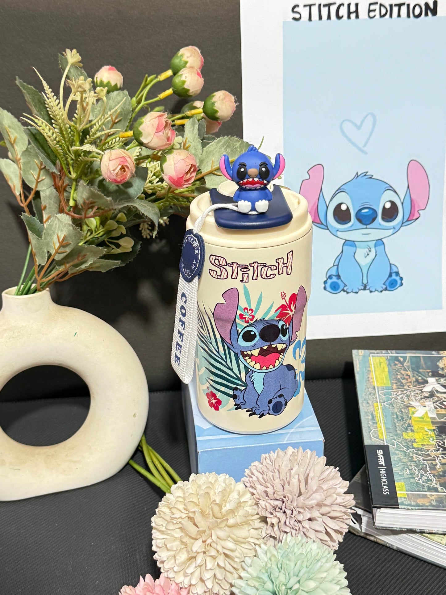 Nestush 450ml insulated kids tumbler with blue character tropical artwork, floral print, character topper and carry strap