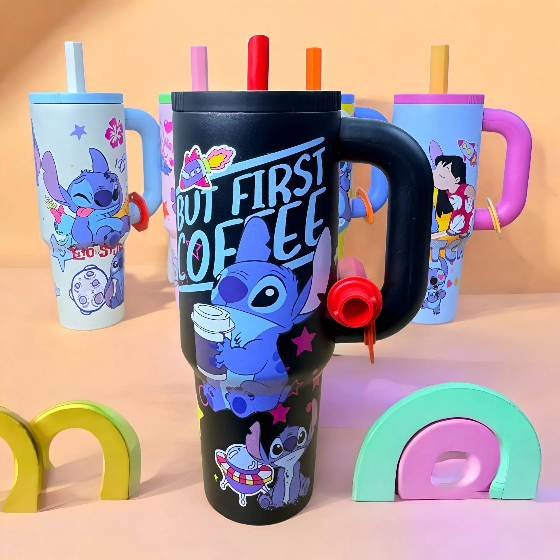 Stitch insulated travel tumbler collection in five colors with reusable straws, leak-resistant lids and comfortable handles