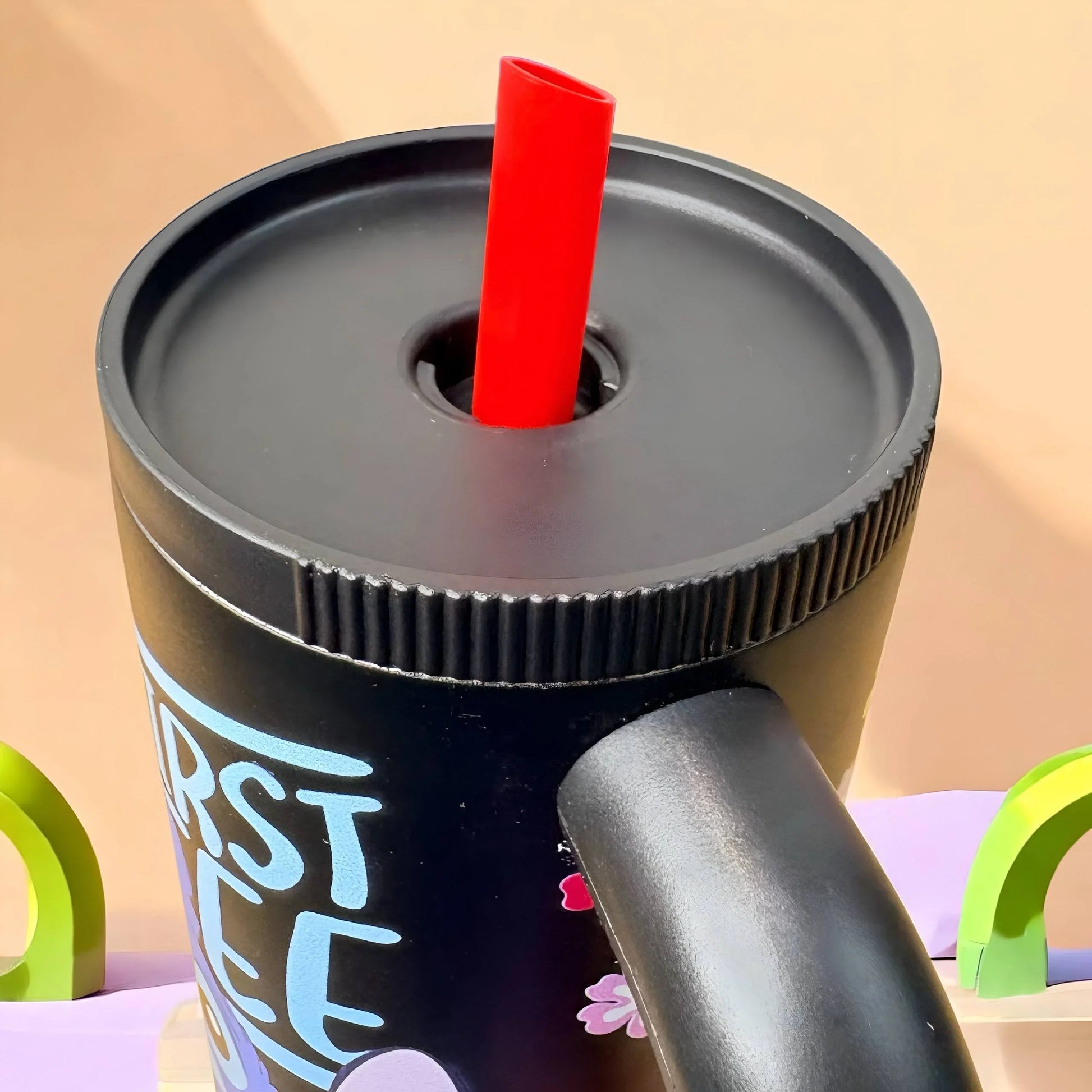 Stitch insulated travel tumbler collection in five colors with reusable straws, leak-resistant lids and comfortable handles