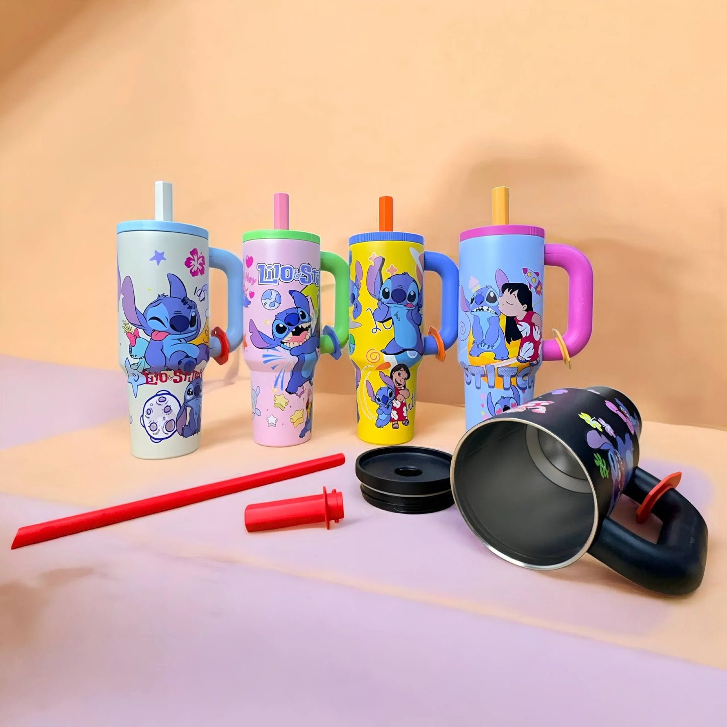 Stitch tumbler with removable lid, reusable straw and stainless steel vacuum insulated interior
