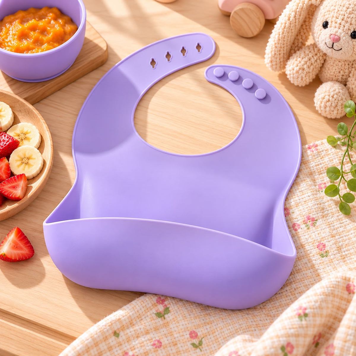 Lavender silicone baby bib with deep crumb-catcher pocket